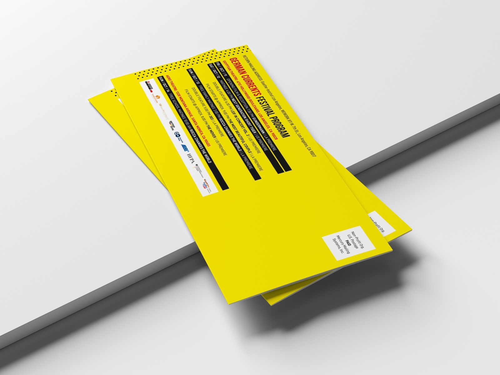 German Currents festival program mailer showing the black, yellow and red color system