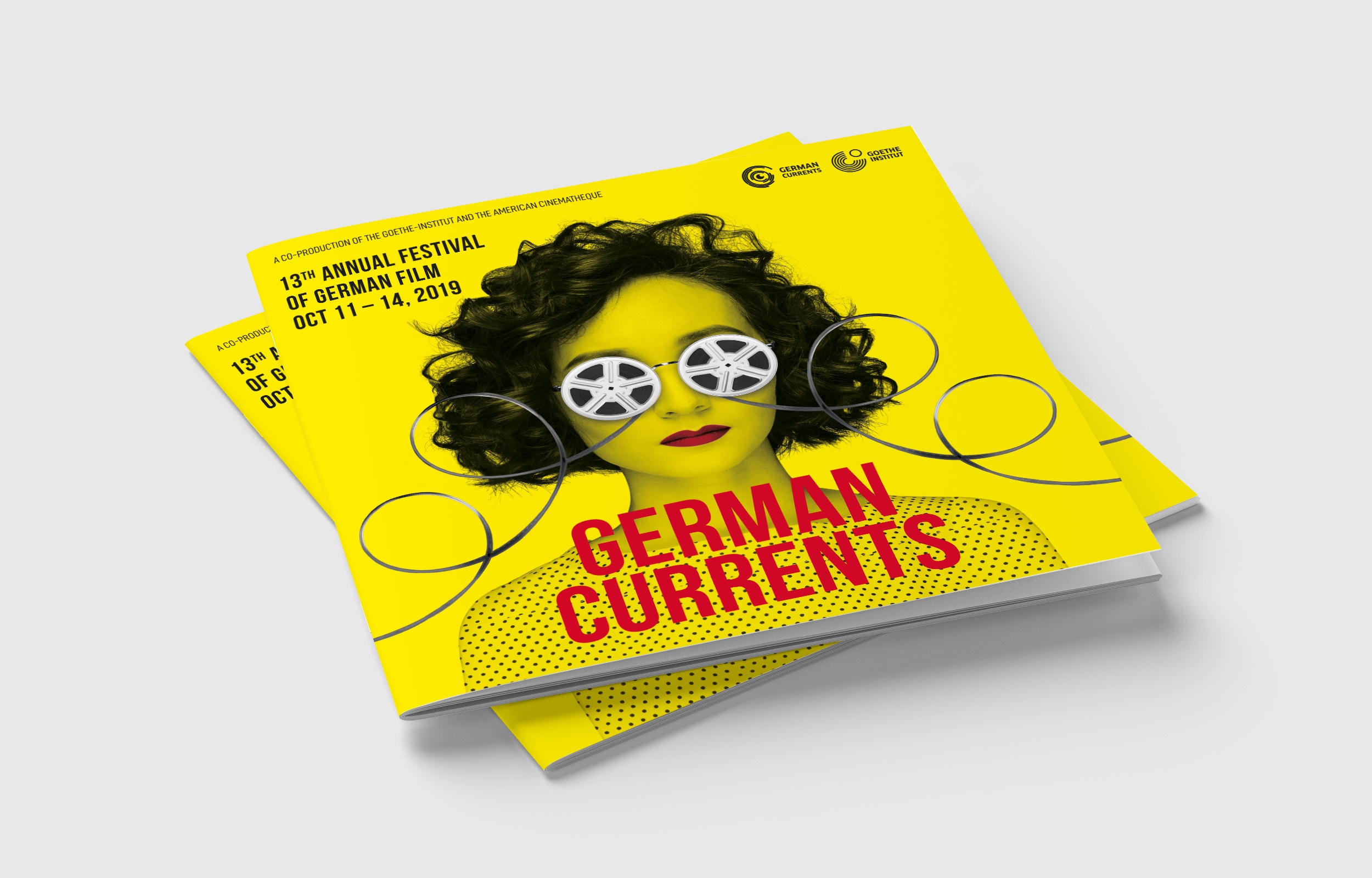 German Currents program booklet covers stacked