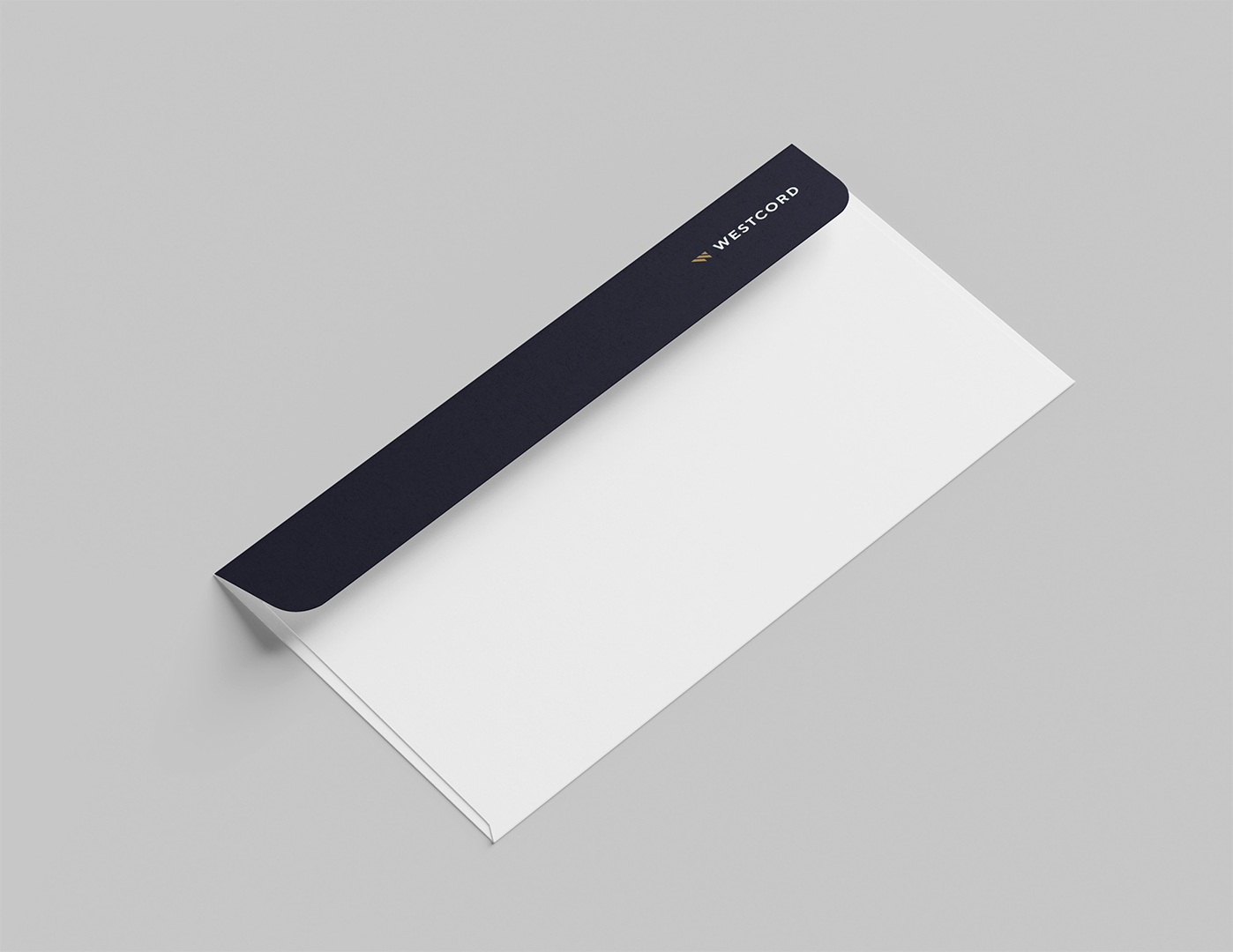 Westcord branded envelope with a navy flap, gold W mark and white wordmark.